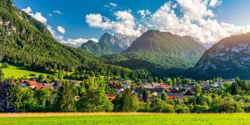 mountains with small village in green valley Kranjska Gora Slovenia