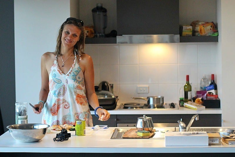 woman standing in a kitchen