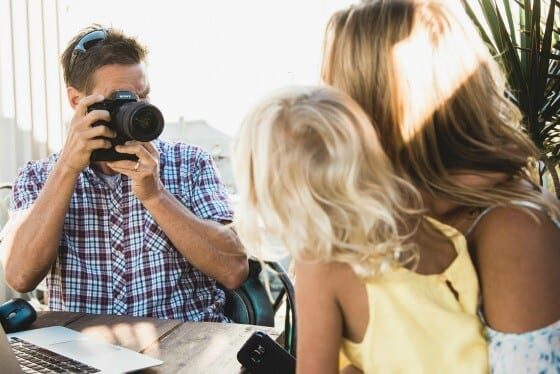 man taking a picture of a girl